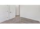 Bedroom with carpet, base molding, and doors at 3278 Greenhill Dr, Villa Rica, GA 30180