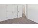 Neutral bedroom with closet and attached bath access at 3278 Greenhill Dr, Villa Rica, GA 30180