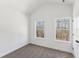 Cozy bedroom with two bright windows at 3278 Greenhill Dr, Villa Rica, GA 30180