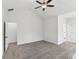 Spacious bedroom with neutral carpet, ceiling fan, and ample natural light from windows at 3278 Greenhill Dr, Villa Rica, GA 30180