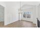 Bright dining room features wainscoting, wood floors and backyard views at 3278 Greenhill Dr, Villa Rica, GA 30180