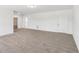 Large, open-concept living room with plush carpeting and neutral paint at 3278 Greenhill Dr, Villa Rica, GA 30180