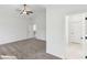 Spacious main bedroom with vaulted ceilings, carpet, and access to ensuite bathroom at 3278 Greenhill Dr, Villa Rica, GA 30180