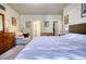 Bright bedroom features a comfortable bed, with ensuite bathroom and walk-in closet at 5114 Arnold St, Covington, GA 30014