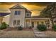 Charming two-story home with inviting front porch and well-maintained landscaping at 5114 Arnold St, Covington, GA 30014