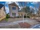 Charming two-story home with a covered front porch and landscaped front yard at 5114 Arnold St, Covington, GA 30014