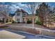 Inviting two-story home featuring a covered front porch and meticulous landscaping at 5114 Arnold St, Covington, GA 30014