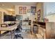 Functional home office with dual monitors, a well-organized desk, and ample natural light for productive work sessions at 5114 Arnold St, Covington, GA 30014