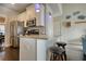 Cozy kitchen with stainless steel appliances, barstool seating, and pendant lighting at 5114 Arnold St, Covington, GA 30014