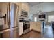 Well-equipped kitchen featuring stainless steel appliances and sleek countertops at 5114 Arnold St, Covington, GA 30014