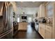 Modern kitchen with white cabinets, stainless steel appliances, and an open layout at 5114 Arnold St, Covington, GA 30014