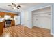 Open kitchen layout with stainless steel appliances, white refrigerator, and pantry area at 164 Oxbo Rd, Roswell, GA 30075