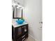 Stylish powder room with modern sink and vanity at 164 Oxbo Rd, Roswell, GA 30075