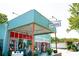 Unique storefront exterior with colorful accents and vintage charm at 164 Oxbo Rd, Roswell, GA 30075
