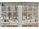 Large window with wooded street view at 164 Oxbo Rd, Roswell, GA 30075
