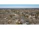 Aerial view of the neighborhood showing the river winding through the trees at 122 Little Ridge Rd, Berkeley Lake, GA 30096