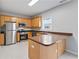Well-equipped kitchen with stainless steel appliances and wooden cabinets at 129 Prospect Path, Hiram, GA 30141