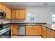 Functional kitchen with stainless steel appliances and wooden cabinetry at 129 Prospect Path, Hiram, GA 30141
