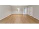 Open living area with wood-look flooring and easy access to other areas at 129 Prospect Path, Hiram, GA 30141
