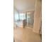 Bathroom featuring a bathtub with tile surround and glass enclosed shower at 1847 Kingsmere Run Dr, Loganville, GA 30052