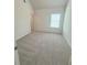 Spacious bedroom with plush carpeting and natural light, ready for personalization at 1847 Kingsmere Run Dr, Loganville, GA 30052