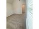 Bright bedroom featuring plush carpeting, a walk-in closet, and lots of natural light at 1847 Kingsmere Run Dr, Loganville, GA 30052