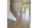Inviting foyer with natural light and a staircase, perfect for welcoming guests into your new home at 1847 Kingsmere Run Dr, Loganville, GA 30052