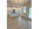 Charming kitchen with an island and backyard access at 1847 Kingsmere Run Dr, Loganville, GA 30052