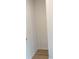 Walk-in pantry with a standard power outlet and light wood flooring at 1847 Kingsmere Run Dr, Loganville, GA 30052