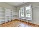 Walk-in closet with hardwood floors and built-in shelving at 270 New Hope Rd, Lawrenceville, GA 30046