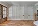Entryway features hardwood floors, white wainscoting, and front door with sidelights at 270 New Hope Rd, Lawrenceville, GA 30046