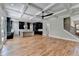 Spacious open-concept living area with access to kitchen and staircase at 270 New Hope Rd, Lawrenceville, GA 30046