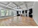 Spacious open-concept kitchen and living area featuring hardwood floors and modern finishes at 270 New Hope Rd, Lawrenceville, GA 30046