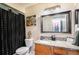 Well-lit bathroom showcasing granite countertops and ample storage under the sink at 3175 Seven Pines Ct # 207, Atlanta, GA 30339