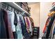 Walk-in closet featuring built in shelving for storage at 3175 Seven Pines Ct # 207, Atlanta, GA 30339