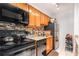 Updated kitchen featuring stainless steel appliances, granite countertops and tile backsplash at 3175 Seven Pines Ct # 207, Atlanta, GA 30339