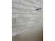Close up of a bright white subway tile backsplash with off white grout at 106 Cottage Gate Ln, Roswell, GA 30076