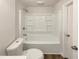 Clean bathroom with a shower-tub combo at 1665 Ridgeview Nw Dr, Conyers, GA 30012