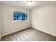 Cozy bedroom features a large window with a view at 1665 Ridgeview Nw Dr, Conyers, GA 30012