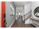 Welcoming foyer with hardwood floors, staircase, and stylish decor at 428 Madison Lakeview Dr, Acworth, GA 30102