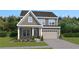 Two-story home featuring gray siding, a two-car garage and professionally landscaped yard at 428 Madison Lakeview Dr, Acworth, GA 30102