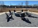Outdoor fire pit with Adirondack chairs, perfect for community gatherings and cozy evenings at 428 Madison Lakeview Dr, Acworth, GA 30102