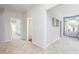 Neutral hallway with carpet and doorways to various rooms at 428 Madison Lakeview Dr, Acworth, GA 30102