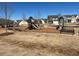 Community playground with slides surrounded by lush lawns, benches, and beautiful homes at 428 Madison Lakeview Dr, Acworth, GA 30102