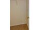 Empty walk-in closet with carpeted floor and top shelf at 770 Parkway Rd, Union City, GA 30291