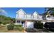 Charming townhome with brick accents, attached garage, and well-maintained landscaping at 770 Parkway Rd, Union City, GA 30291