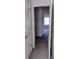Upstairs hallway featuring neutral carpet and bright doors at 770 Parkway Rd, Union City, GA 30291