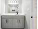 Bathroom vanity with a light gray cabinets, white countertops and black hardware at 2977 Heritage Villas Dr, Lithonia, GA 30038