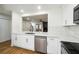 Renovated kitchen with stainless steel appliances and white marble countertops at 2977 Heritage Villas Dr, Lithonia, GA 30038