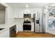 Kitchen featuring stainless steel appliances, marble countertops and a bright breakfast area at 2977 Heritage Villas Dr, Lithonia, GA 30038